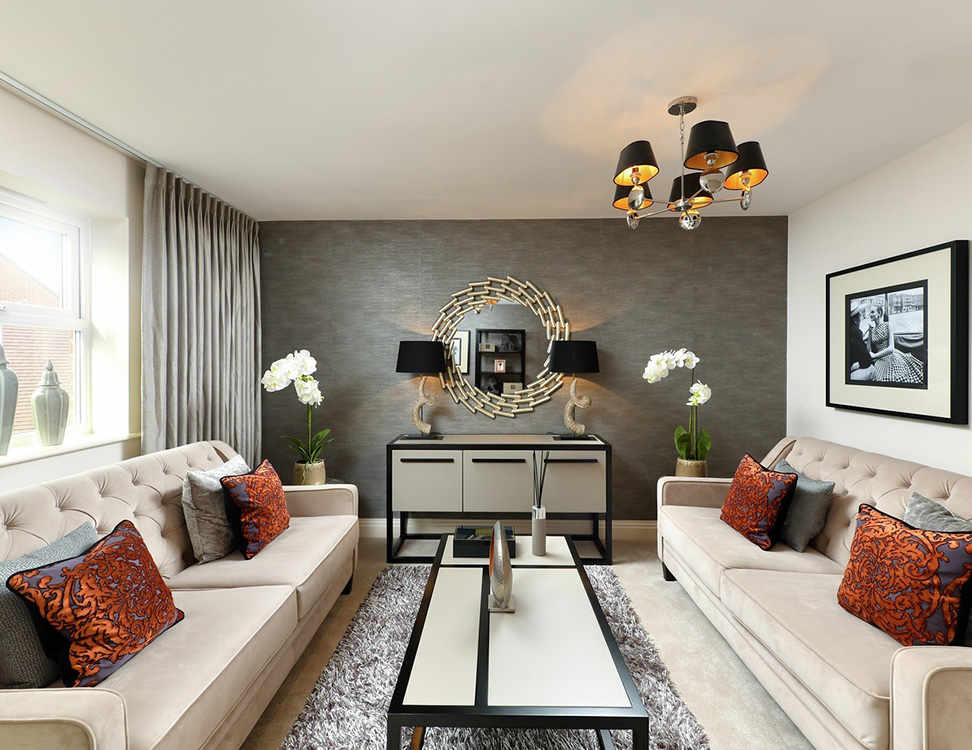 The spacious living room of a new property at Woodhurst Park—a development by Berkeley Group. 