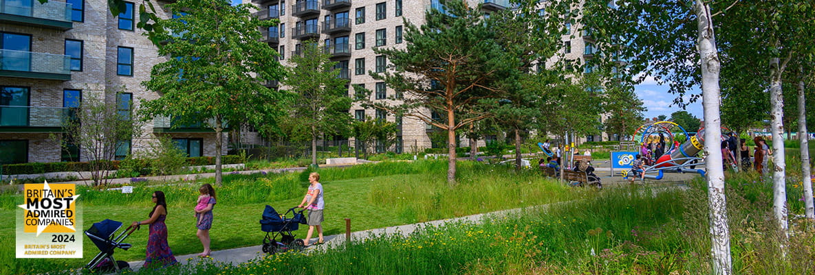 Exterior image of The Green Quarter with Britain's Most Admired Company logo