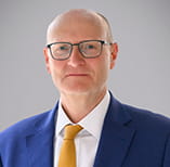 A headshot of Richard Stearn in 2026