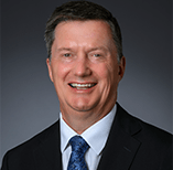 A headshot of Richard Dakin