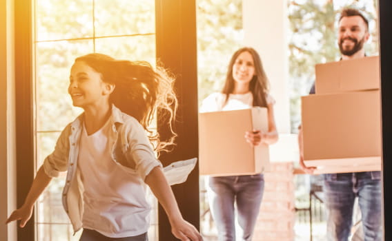 An image of a family moving into their new home