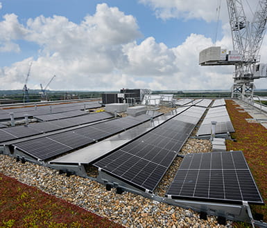 An image of solar panels on top of a building