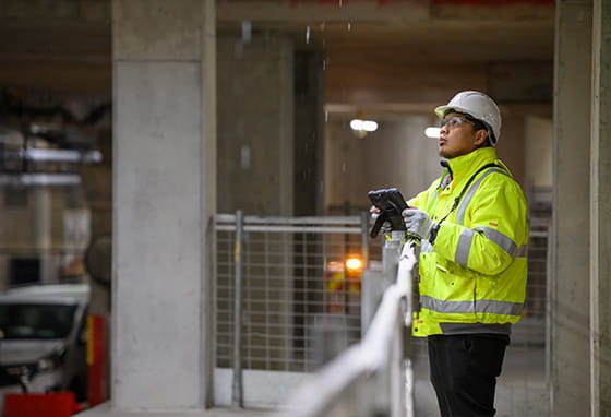 An image of a person watching water drip rain down