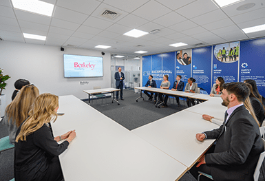 An image of people sitting in Berkeley Academy attending training