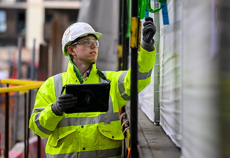 An image of a worker inspecting some work done