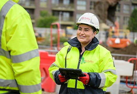 An image of people on a construction site in PPE