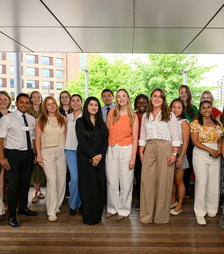 An image of a bunch of people standing together for a photo