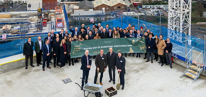 A photograph of Kings Road Park staff and their partners