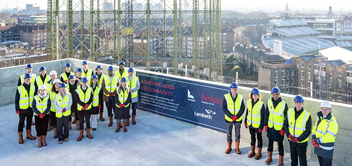 A picture of people standing on a roof together