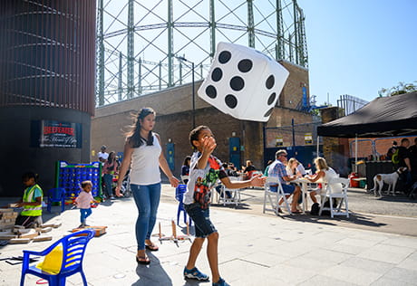 An Image of a Community Event at Oval Village