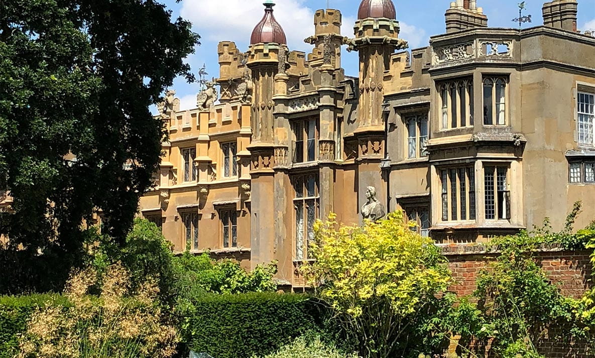 The outside of Knebworth House on a sunny day.