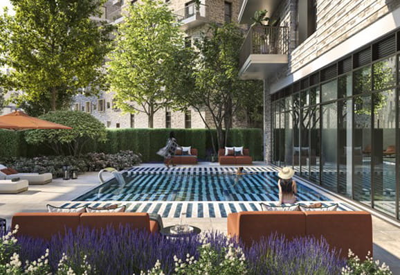 Outdoor pool at Bow Green new build development with homes available now