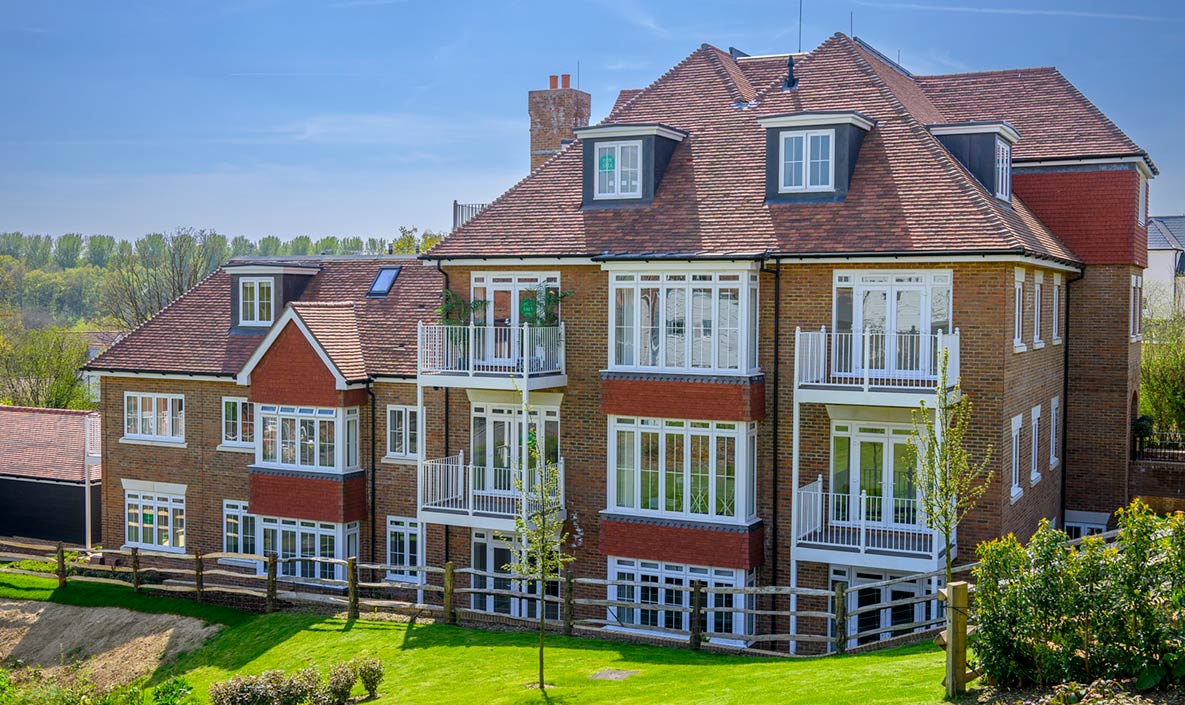 The outside of a block of different apartments in the Hollyfields development in Tunbridge Wells.