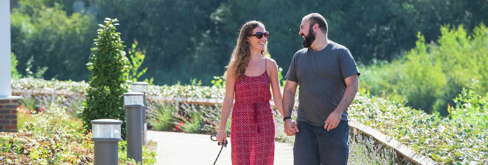 Tom McLeod and Jaimie Tyler walking through Holborough Lakes.
