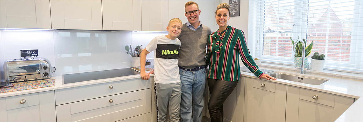 Marcus and Caroline Millichope, and Marcus’s son Rufus, in their bright Hollyfields home kitchen.