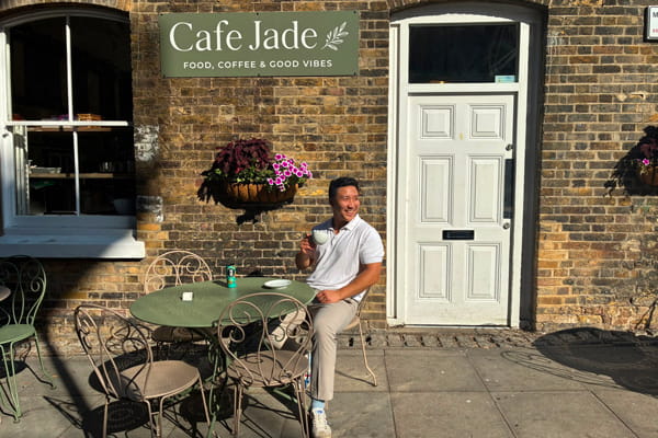 Kenny enjoying a coffee at Café Jade near Royal Arsenal Riverside