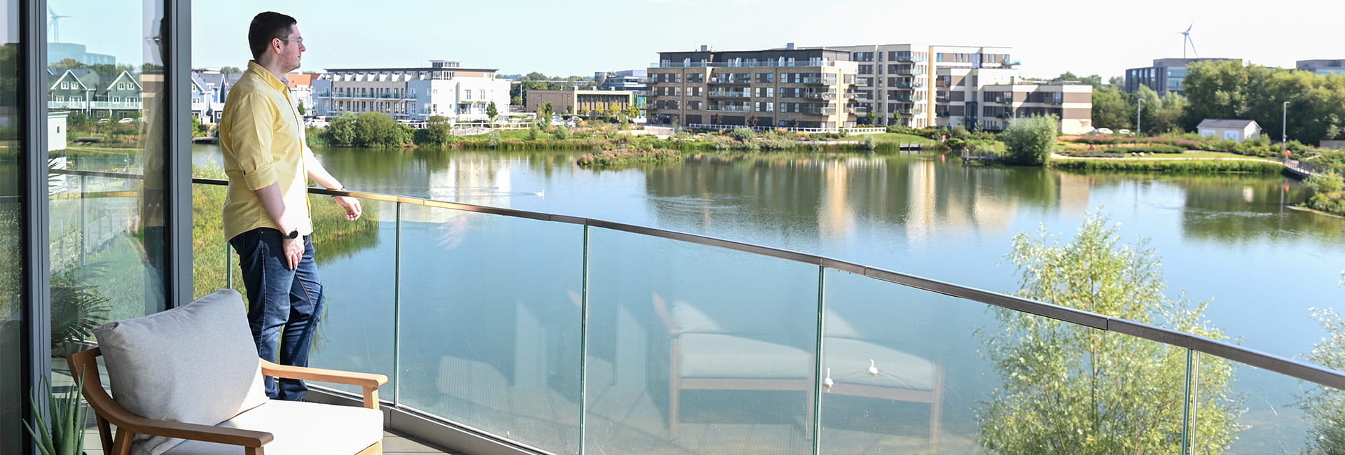 A Picture of David on The Balcony of His New Home