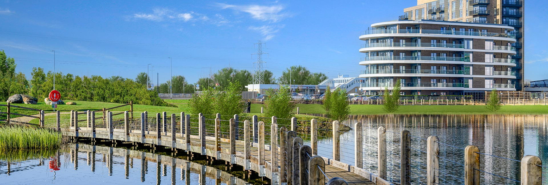 Exterior image of Bankside Gardens with lake view