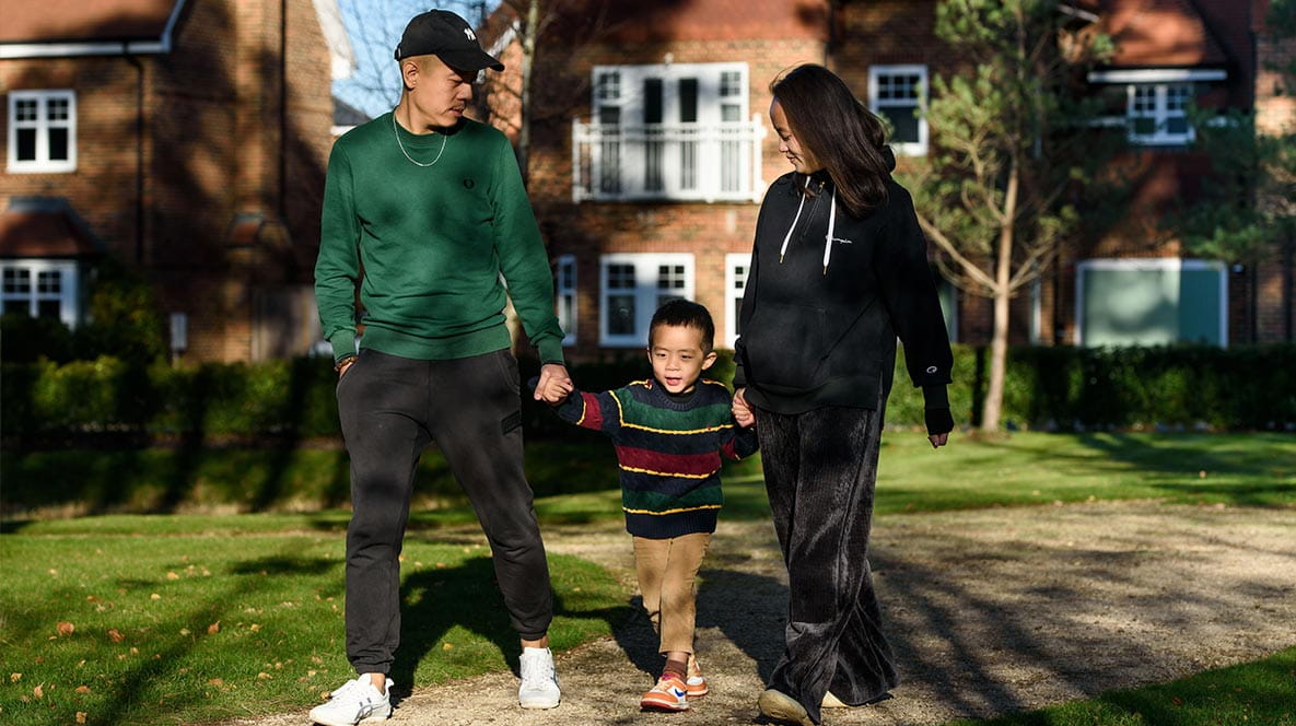 An image of the family walking outside at Hartland Village