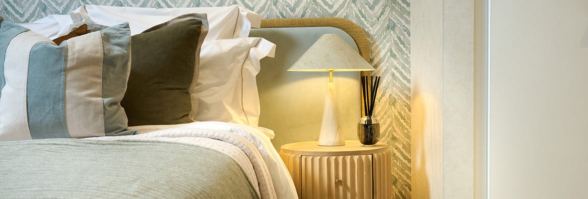 An interior Bedroom image showing a close up of the Bed