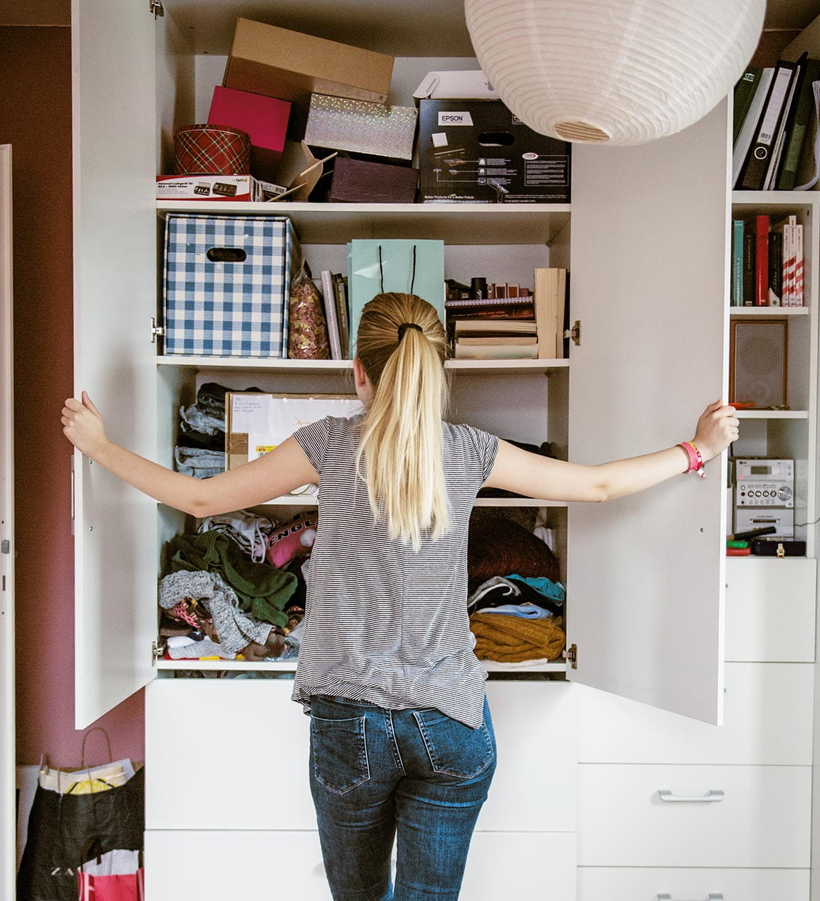 A messy cupboard that needs decluttering