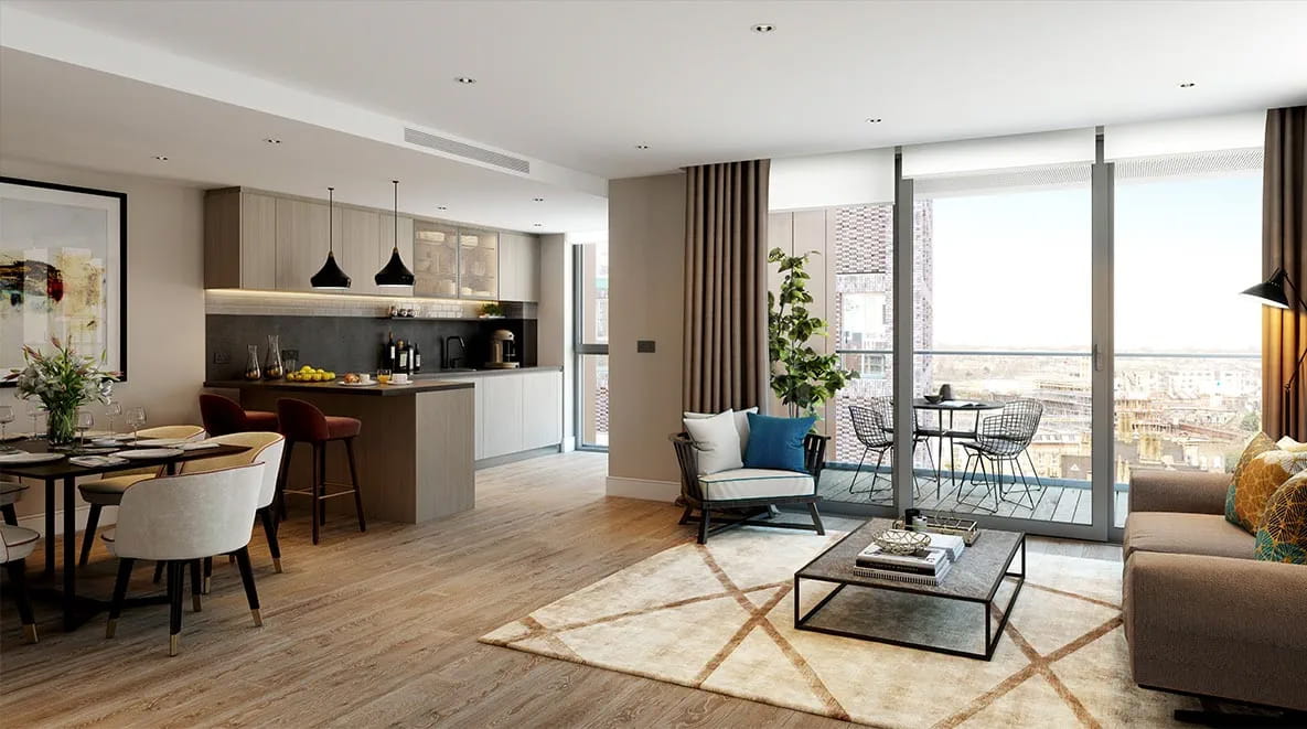 An open-plan kitchen, dining and living room featuring neutral tones and a large rug in the centre of the room.
