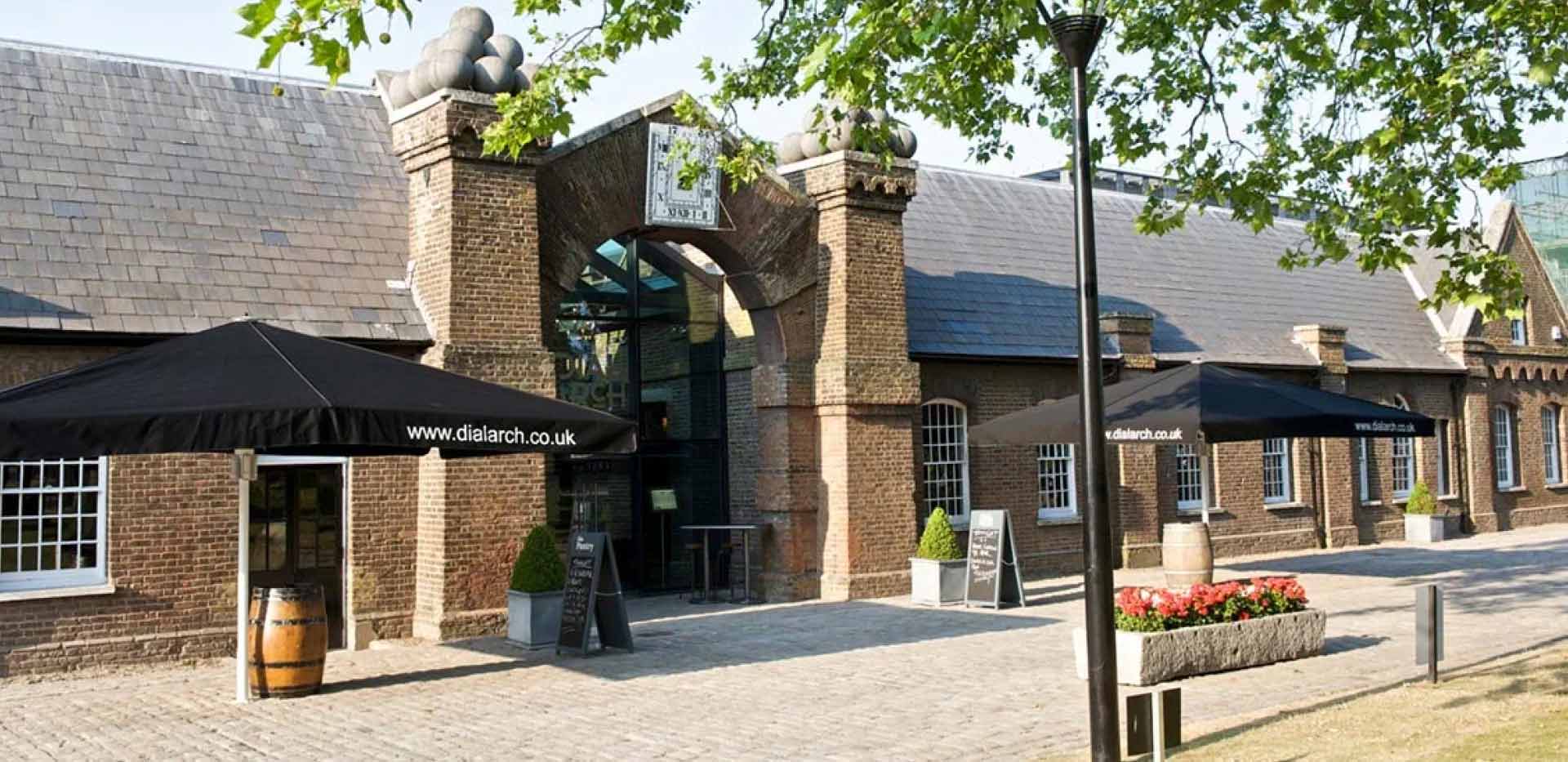 Dial Arch Square in the present day, featuring a large open space and Young’s public house—a renovated building dating back to the 1720s.