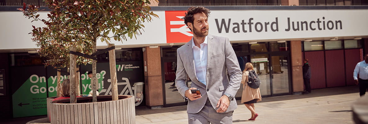 An image of a man by the Watford Junction station