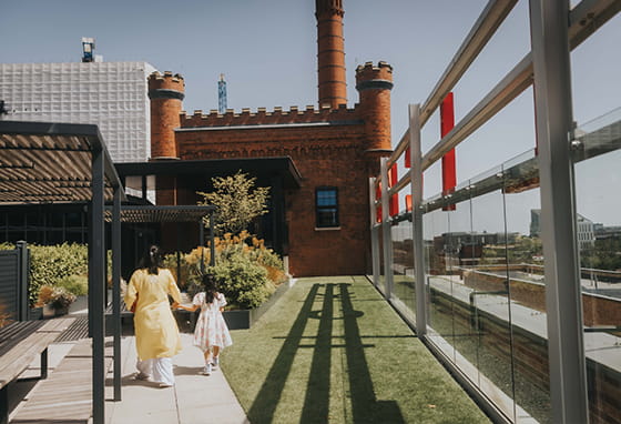 An image of Kate and her daughter on the Roof Terrace at Horlicks Quarter