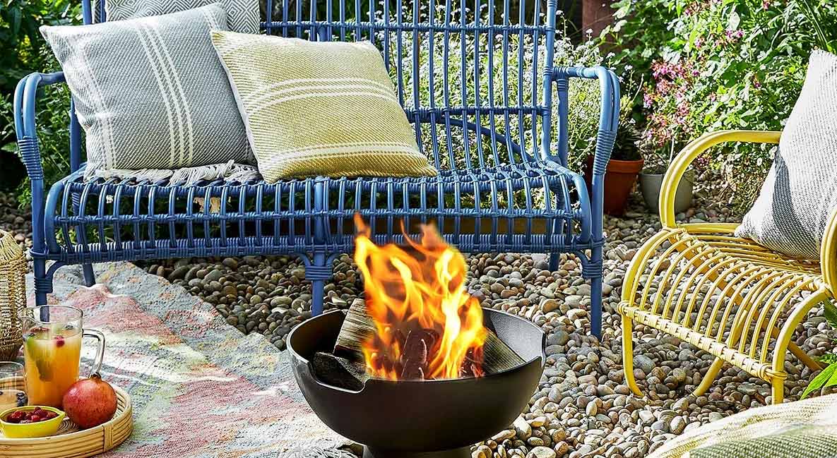 An outdoor seating area with a firepit.
