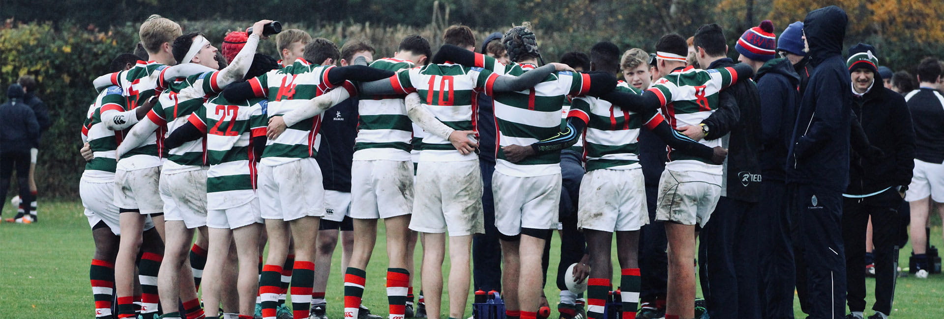 An image of a Rugby Team huddle