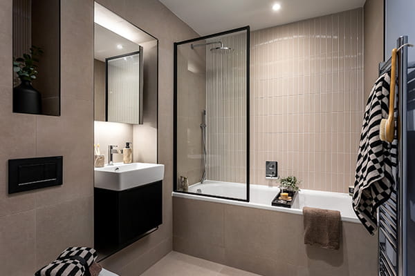 Reading Riverworks, spacious showhome bathroom with a dark design