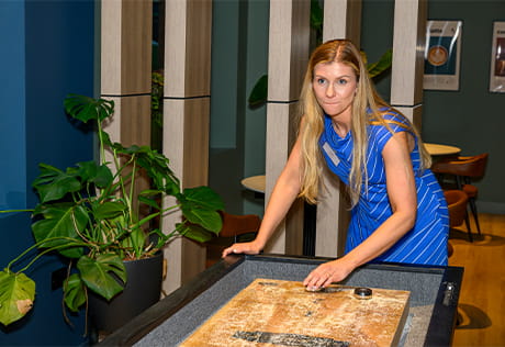 Guest enjoying the games room with shuffleboard