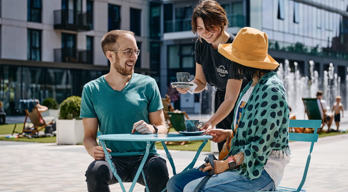 Members of the public enjoying amenities near London Dock