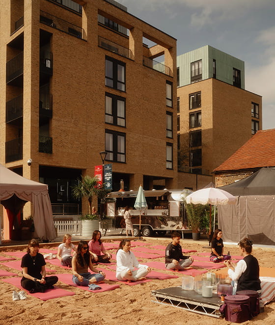 An image of children playing in the sand at Wandsworth Mills