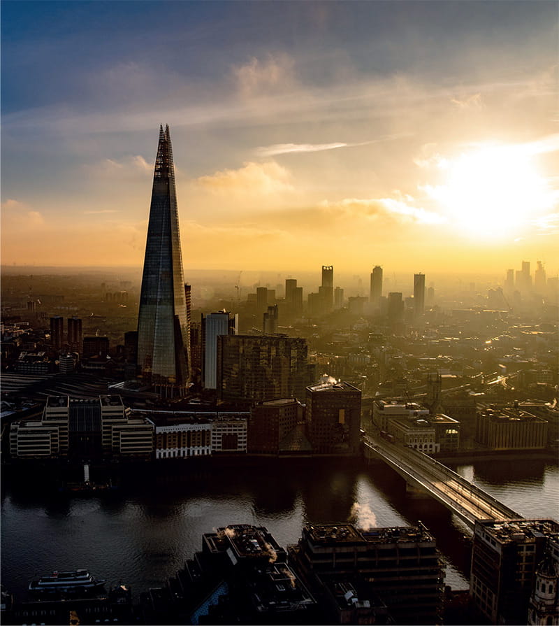 A view of London’s skyline, including The Shard, which towers over other buildings.
