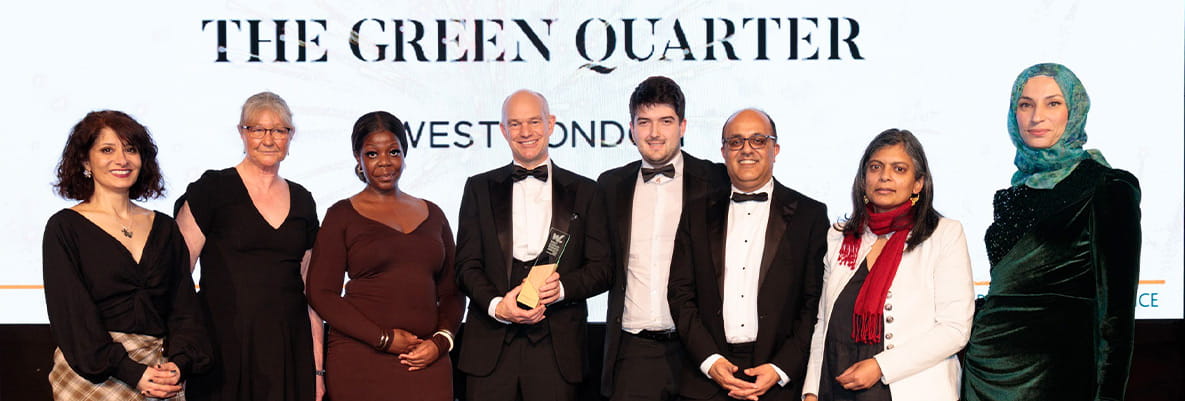 An image of people from The Green Quarter with the award