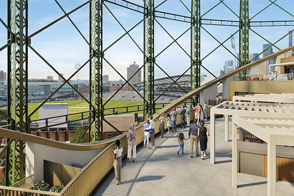 CGI of a development platform with a metal surrounding structure built into its design, overlooking a sports ground.