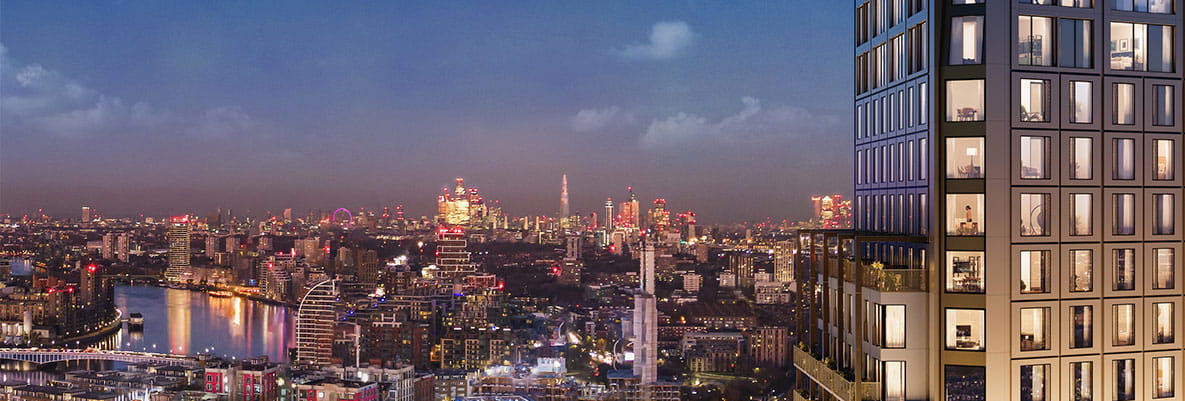 An exterior night time CGI of Wandsworth Mills looking over London