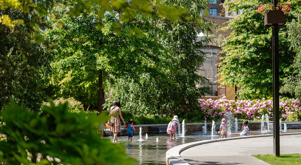 Residents enjoying the green open space and walking water-feature