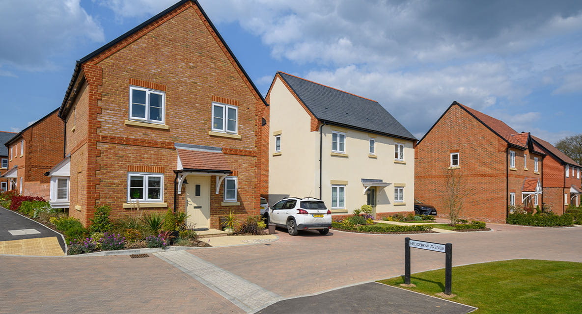 The exterior of some homes in Berkeley Group’s Abbey Barn Park development.