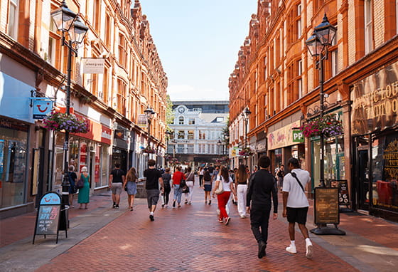 An image of people walking round shops in Reading