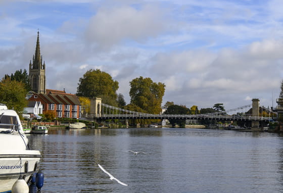 View across the River Thames to Marlow Bridge in Buckinghamshire