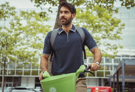 Man in the centre of Milton Keynes with a bike