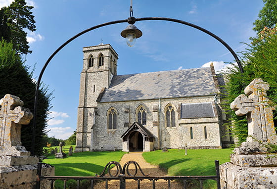 A stone church in Fleet, with a path leading to the entrance