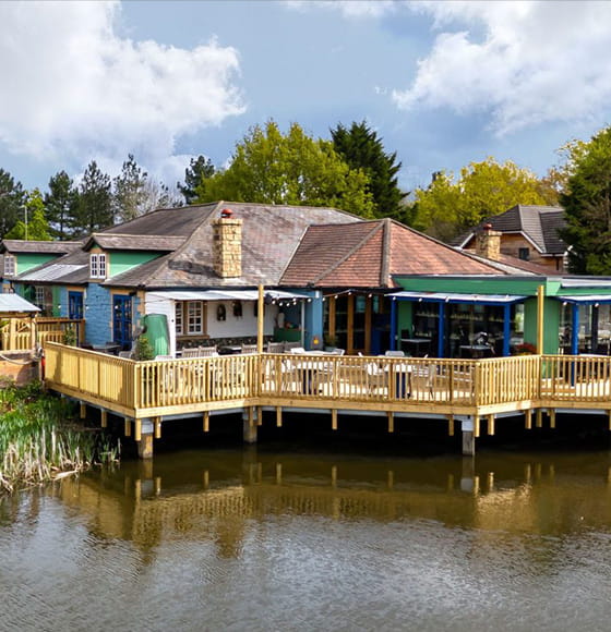 Heron on The Lakes pub with deck over Fleet Pond