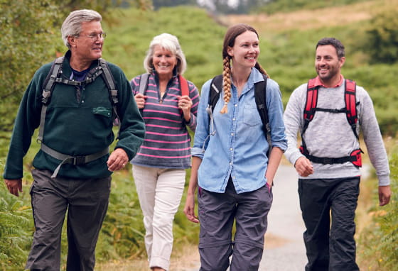 Family walking though the Hampshire countryside