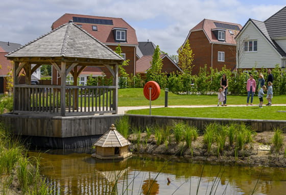 Lake and new build homes at the Foal Hurst Green development, Kent