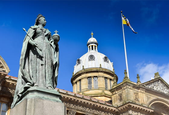 Queen Victoria statue in Victoria Square, Birmingham, with the Council House in the background