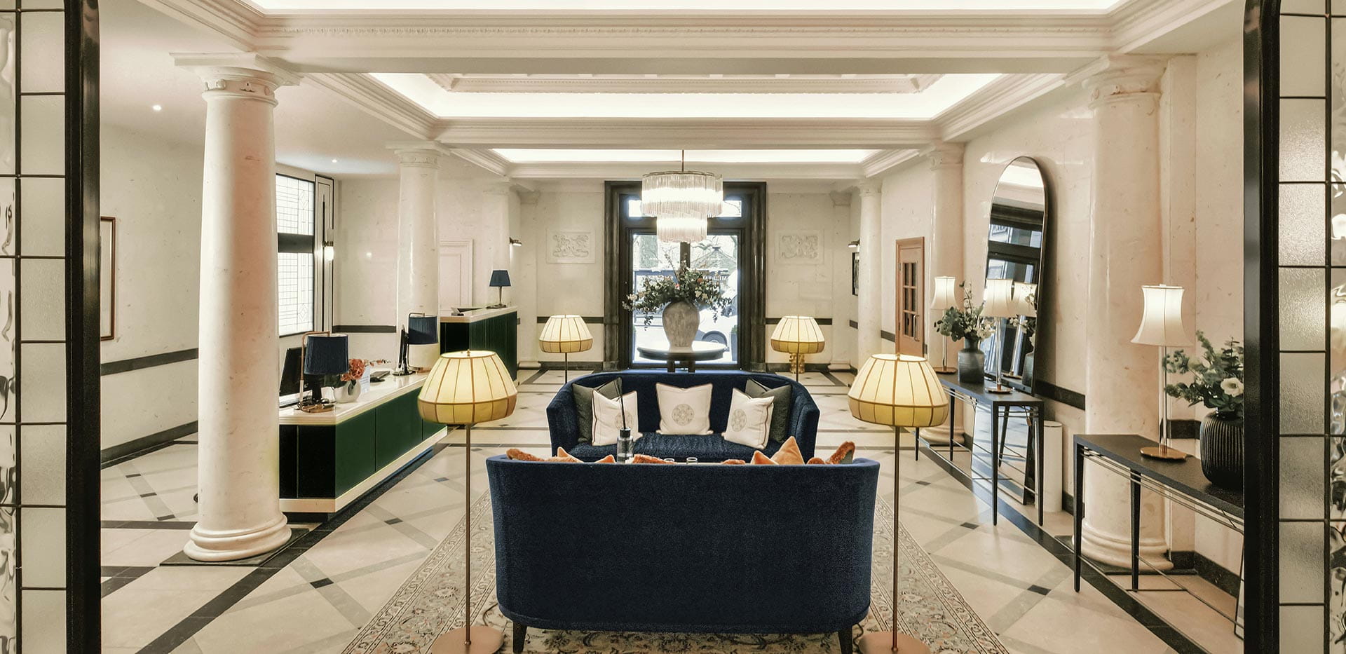 Entrance hall at 9 Millbank complete with white marble decor